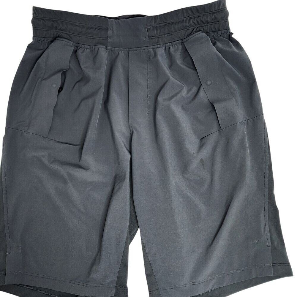 Lululemon Shorts Men's Small Chill Motion Active Bottoms Pockets Melanite Blue